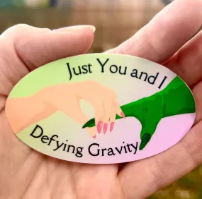 Defying Gravity Sticker